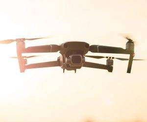 What are the benefits of using drones for filming real estate and commercial buildings
