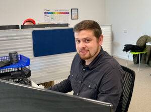 picture-of-Back9-Creative-Google-Ad-Specialist-Gus-at-his-desk