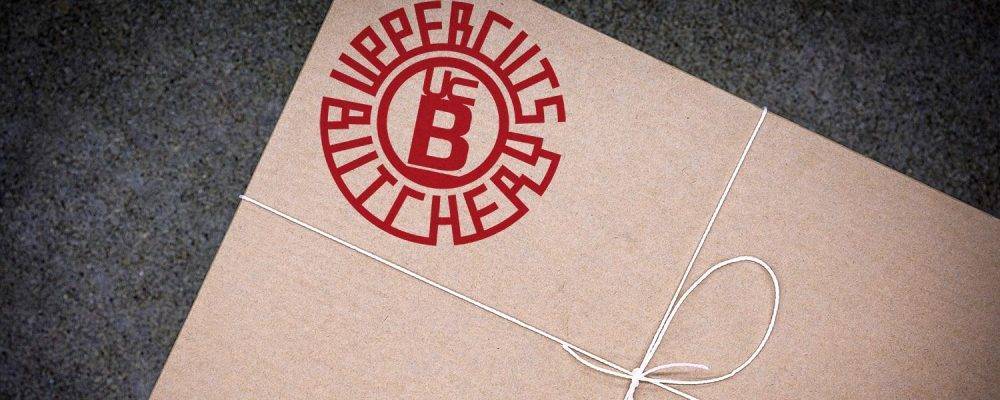 Brown vintage packaging with Uppercuts Butchery Logo printed on